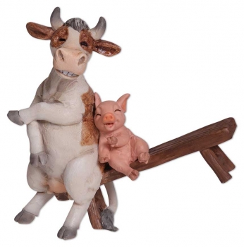 Poly Kuh mit Schweinchen auf Bank 14cm